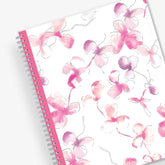 breast cancer awareness 2024 planner by blue sky featuring beautiful pink orchids and white background on the front cover in a 8.5x11 size