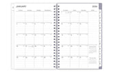 January 2026 - December 2026 weekly monthly planner featuring a monthly view with lined writing space for each date, reference calendars, and light blue monthly tabs