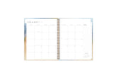 January 2024 - December 2024weekly monthly planner featuring a monthly spread boxes for each day, blank writing space, notes section, reference calendars, and light purple monthly tabs in 8.5x11 size