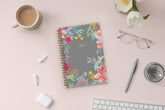 2025 weekly monthly planner featuring floral pattern and gold twin wire-o binding in 5x8 planner size
