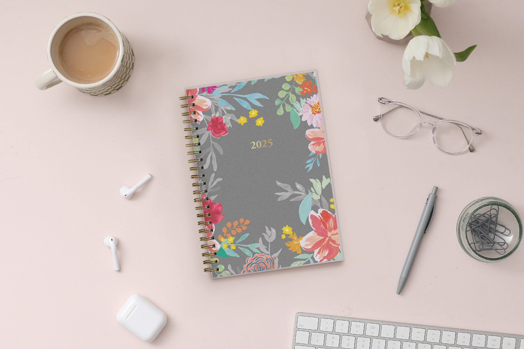 2025 weekly monthly planner featuring floral pattern and gold twin wire-o binding in 5x8 planner size
