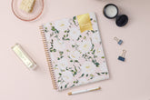 2025 weekly planner in 8.5x11 size with white florals and blush background