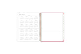 8.5x11 2025 weekly monthly planner features a yearly overview of 2025 and 2026 with contact page for owner of planner and bulleted yearly goals and accomplishments with pink monthly tabs and white text