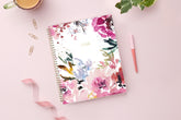 The kelly ventura 2026 weekly monthly planner for blue sky features beautiful watercolored floral cover with gold twin wire-o binding in a 8.5x11 planner size.
