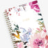 The kelly ventura 2024 weekly monthly planner for blue sky features beautiful watercolored floral cover with gold twin wire-o binding in a 5x8 planner size.