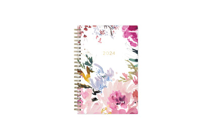 The kelly ventura 2024 weekly monthly planner for blue sky features beautiful watercolored floral cover with gold twin wire-o binding in a 5x8 planner size.