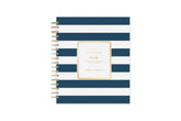 2025 daily monthly from day designer for blue sky featuring a hardcover, navy blue and white stripe design, gold twin wire-o binding in a compact 8x10 planner size.