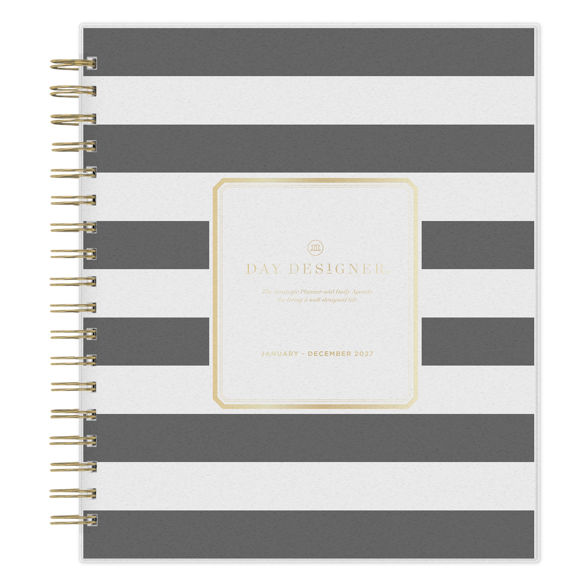A spiral-bound planner with horizontal gray and white stripes, featuring a central gold foil label that reads &
