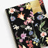 January 2024 - December 2024 featuring floral pattern on a black backcover and gold twin wire-o binding in 8.5x11 planner size