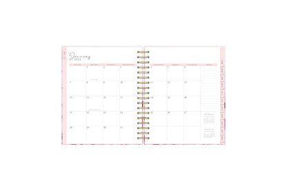 The 2024 Rach Parcell daily planner features a monthly view with ample blank white writing space, reference calendars, notes section, and soft pink monthly tabs.