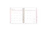 The 2024 Rach Parcell daily planner features a monthly view with ample blank white writing space, reference calendars, notes section, and soft pink monthly tabs.