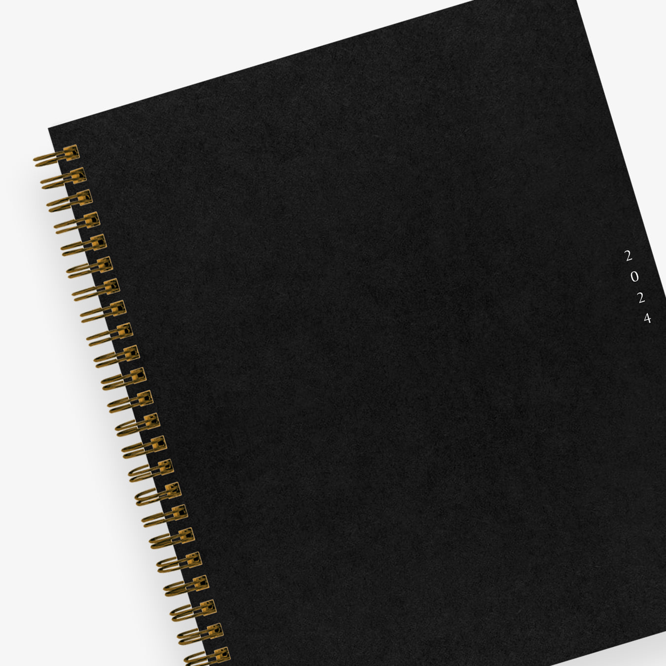 2024 weekly monthly planner featuring gold wire binding 8.5x11 planner size and deep dark green cover