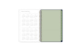 2024-2024 yearly overview spread featuring a view of all the months on one page, and a paper pocket for ultimate storage and organization!
