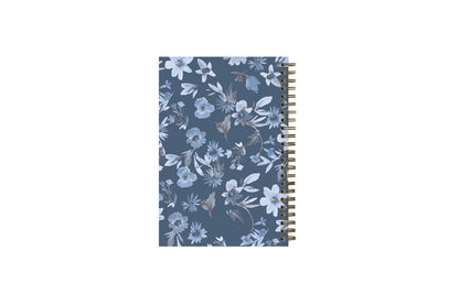 2024 blue sky sustainability weekly monthly planner featuring white and blue floral patterns on a dark blue background 5x8 gold wire-o