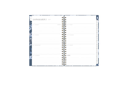 January 2024 - December 2024 weekly monthly planner featuring a weekly spread with lined writing space, notes section, reference calendars, and light purple monthly tabs in 5x8 size