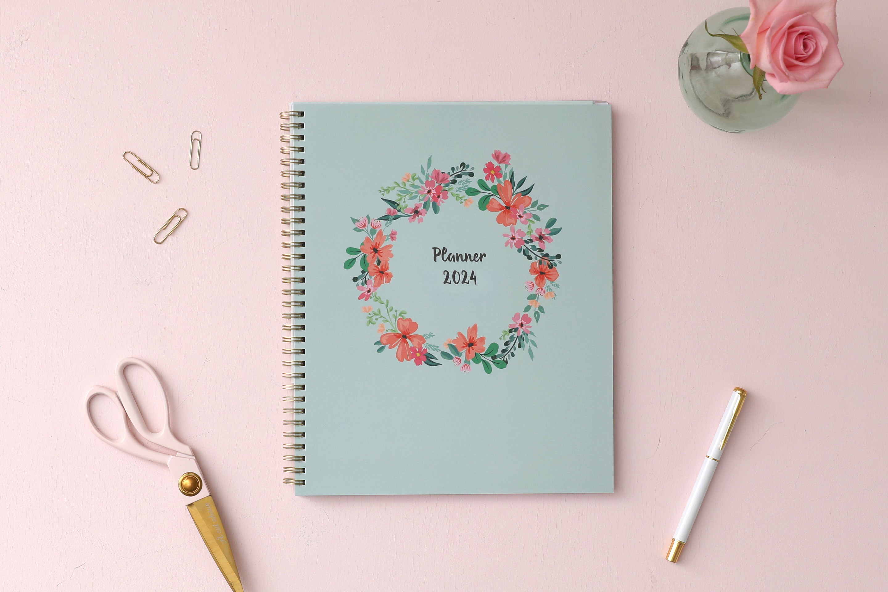 January 2024 to December 2024 weekly monthly planner in 8.5x11 size from day designer for blue sky with mint background and floral pattern, and gold twin wire-o binding