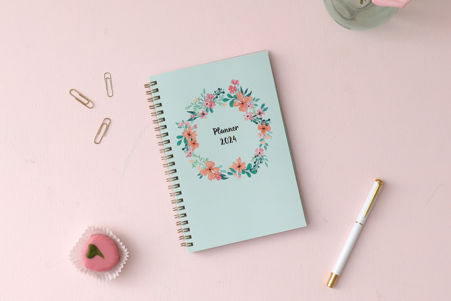 January 2024 to December 2024 weekly monthly planner in 5x8 size from day designer for blue sky with mint background and floral pattern, and gold twin wire-o binding