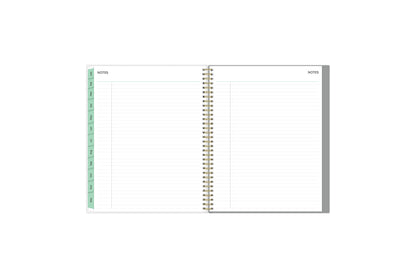 lined notes with mint monthly tabs