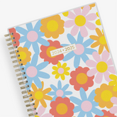 Big floral daisy pattern front cover for this 5.875x8.625 planner notes dated July 2024 - June 2025