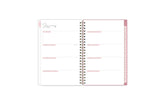 The 2024 Rach parcell planner features a weekly spread view with top goals for the week, blank white writing space for each day, and soft pink monthly tabs.