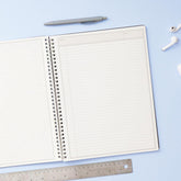 Blue Sky non-dated notebook in 8.5x11 size with ample lined writing space, graph paper format, subject, and dated text box.