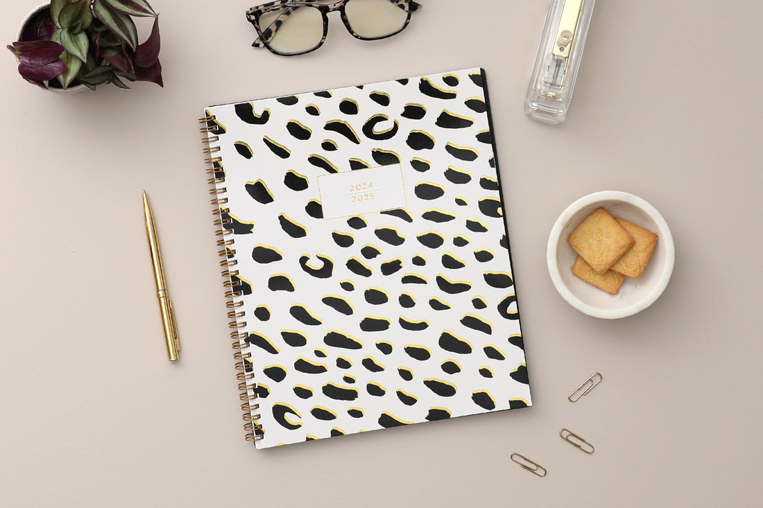 leopard print weekly monthly planner in 8.5x11 planner size by ashley g for July 2024- June 2025