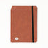 Brown notebook with a black elastic strap on a white background 5.75x8.5