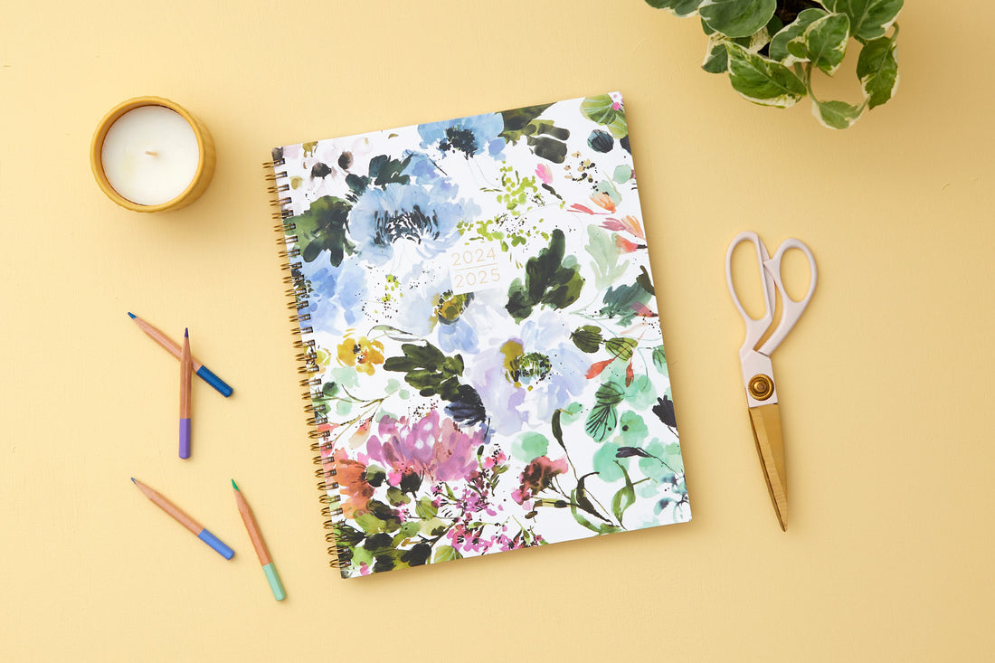 Kelly Ventura for Blue Sky student academic planner in 8.5x11 planner size with brush floral front cover, twin wire-o binding and a weekly monthly layout for July 2024- June 2025