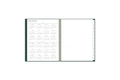 Featuring a yearly overview easily reference dates throughout the year and track your yearly goals in this 8.5x11 planner