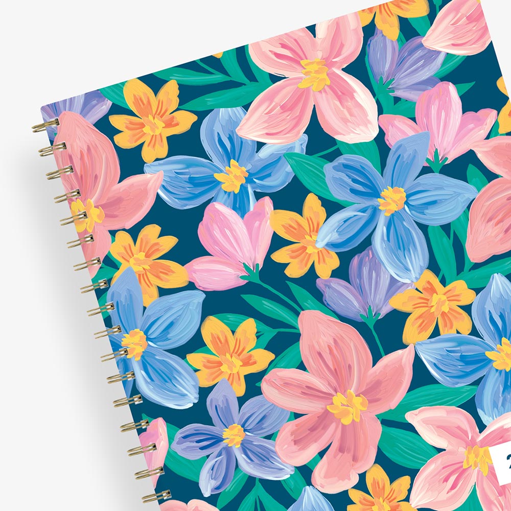 cheerful floral pattern on 8.5x11 planner size for this weekly monthly planner dated for July 2024- June 2025