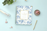 July 2025 - June 2025 weekly monthly 7x9 planner with a blue bouquet floral front cover