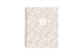 white floral printed front cover on a blush background for this 2025-2026 academic weekly monthly planner