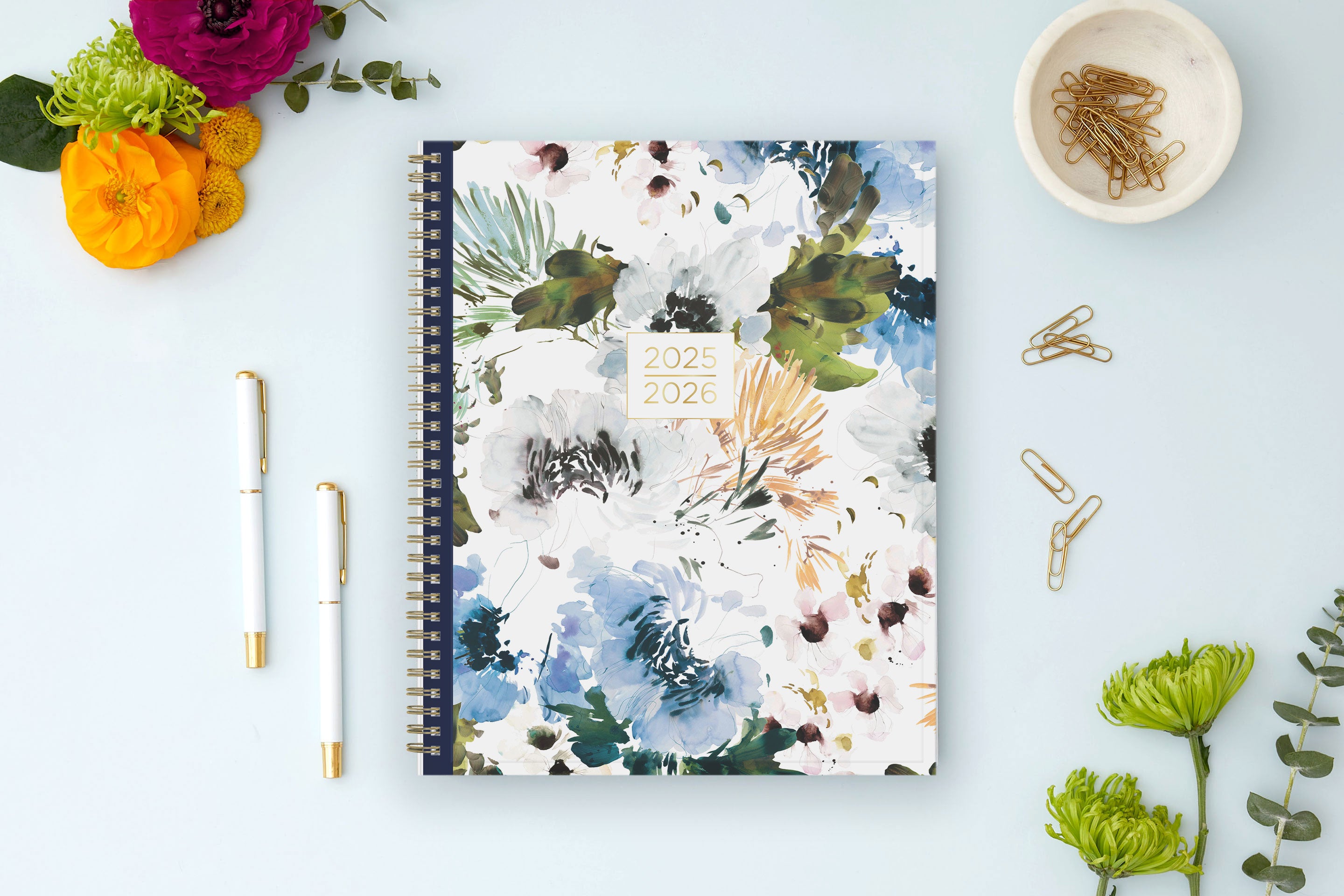 floral front cover on this july 2025 - june 2026 weekly monthly academic planner in 8.5x11 size