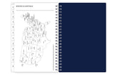 planner with a map of the United States on one page and a solid color on the other, on a white background.