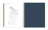Notebook with a map of the United States on one page and a blue cover on the other