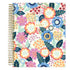 Floral patterned weekly premium planner with a gold spiral binding on a white background