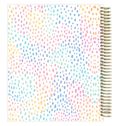 weekly planner 7x9 with a colorful dot pattern and spiral binding on a white background