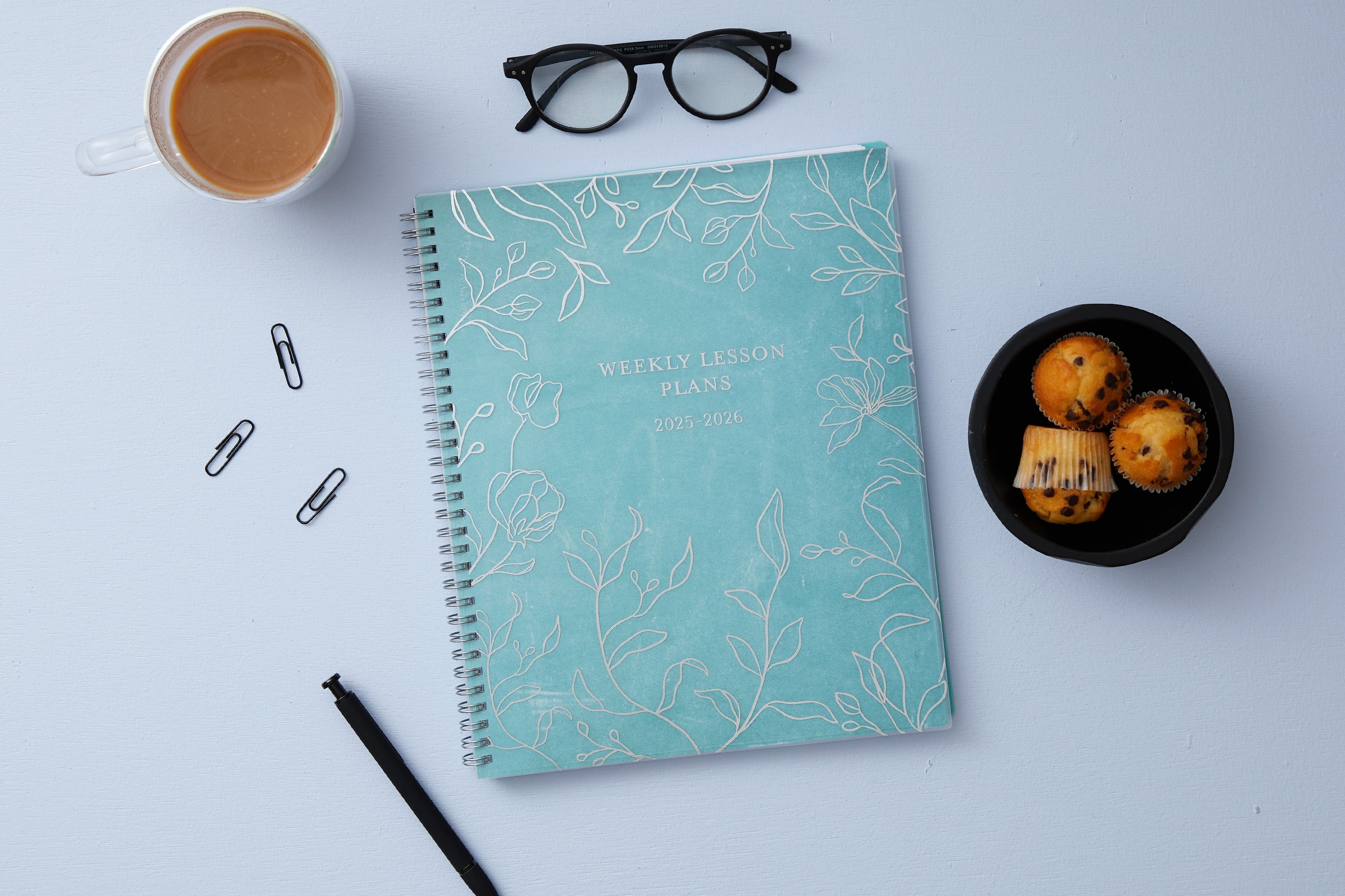 simple lined floral front cover on this teacher lesson planner for 2025-2026