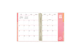 8.5x11 teacher lesson planner featuring a monthly spread with a box for each day, ample clean writing space, lined notes section, and reference calendars. 