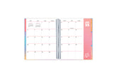 8.5x11 teacher lesson planner featuring a monthly spread with a box for each day, ample clean writing space, lined notes section, and reference calendars. 