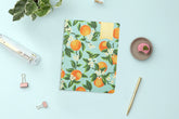 orange mint blossom front cover on this 8.5x11 monthly stapled planner