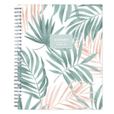Agenda/planner with tropical leaf pattern on a white background