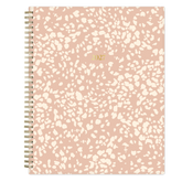 Pink and white patterned planner with &