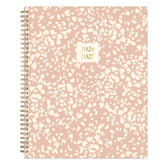 Pink and white speckled planner with &