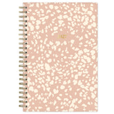 Pink and white patterned planner with &