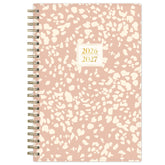 Pink and white patterned planner with &