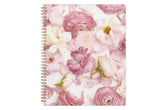 Floral patterned planner with a pink cover on a white background