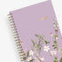 January 2026 - December 2026 monthly planner from Blue Sky features beautiful floral cover design with purple background and gold binding 5x8