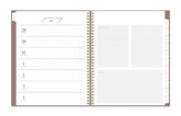 The new and improved Life Note It 2026 weekly planner features a weekly spread with clean white writing space, to do list, goals, and notes section for every important detail needed for planning a successful week in a 8.5x11 planner size