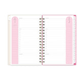open spread daily view of this 5x8 planner featuring lined writing space and white monthly tabs, notes section, and hourly increments